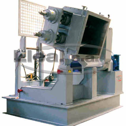 AM-2000 iron knead machine, in the dump position for the rubber sector.